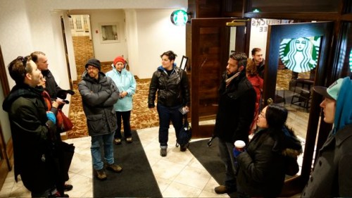 Catching a break from the elements in the Palliser Hotel - former location of the Kings Arms Pub.